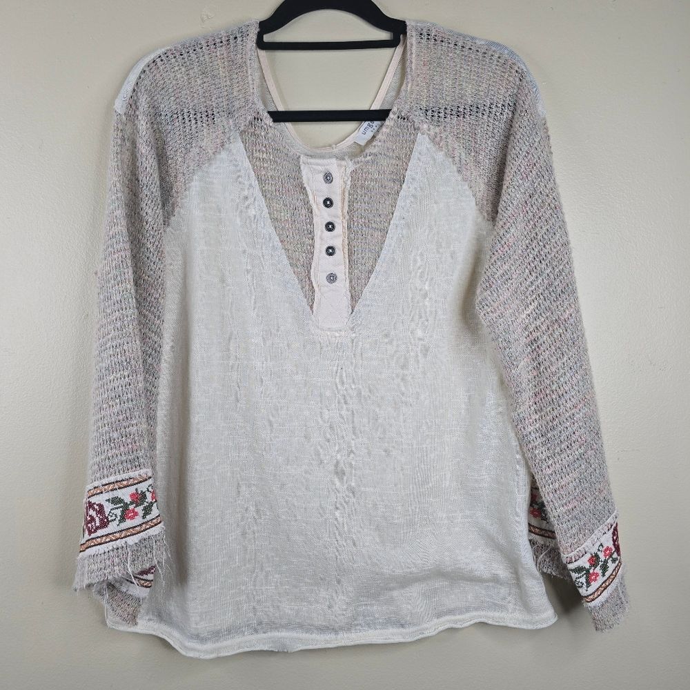 Boho Chic Knit Top with Floral Accents